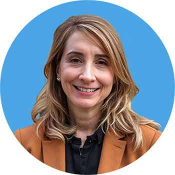 headshot of Sharon VanZeeland, Vice President of Strategy & Corporate Development, Rockwell Automation on a blue circle background
