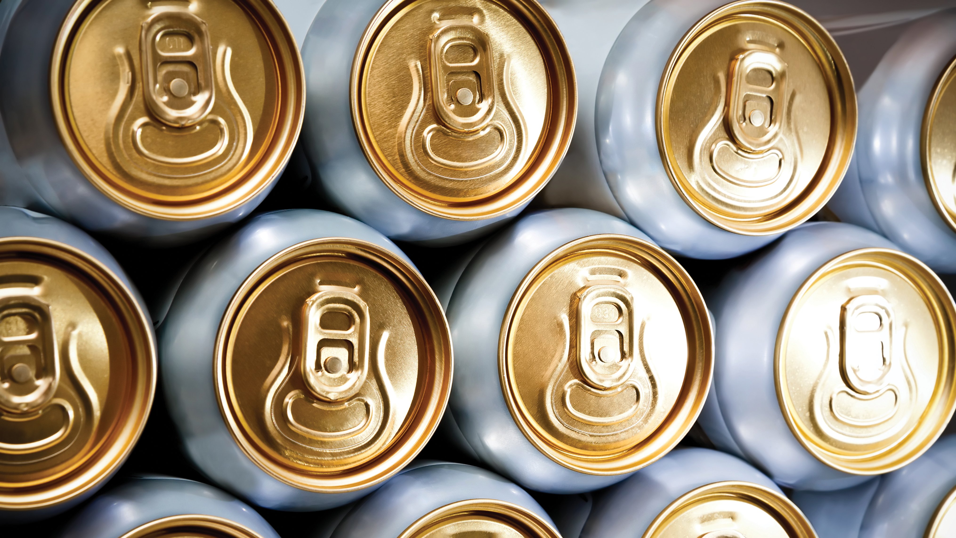 stacked aluminum beer cans background