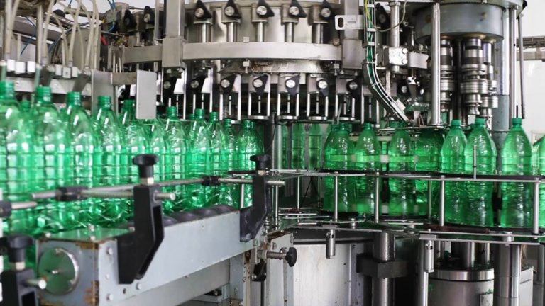 green bottles on production line