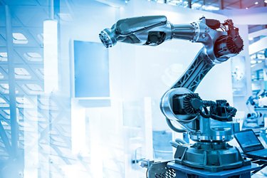 robotic arm catch for electronic assembly line. The robot for smart technology manufacturing process.