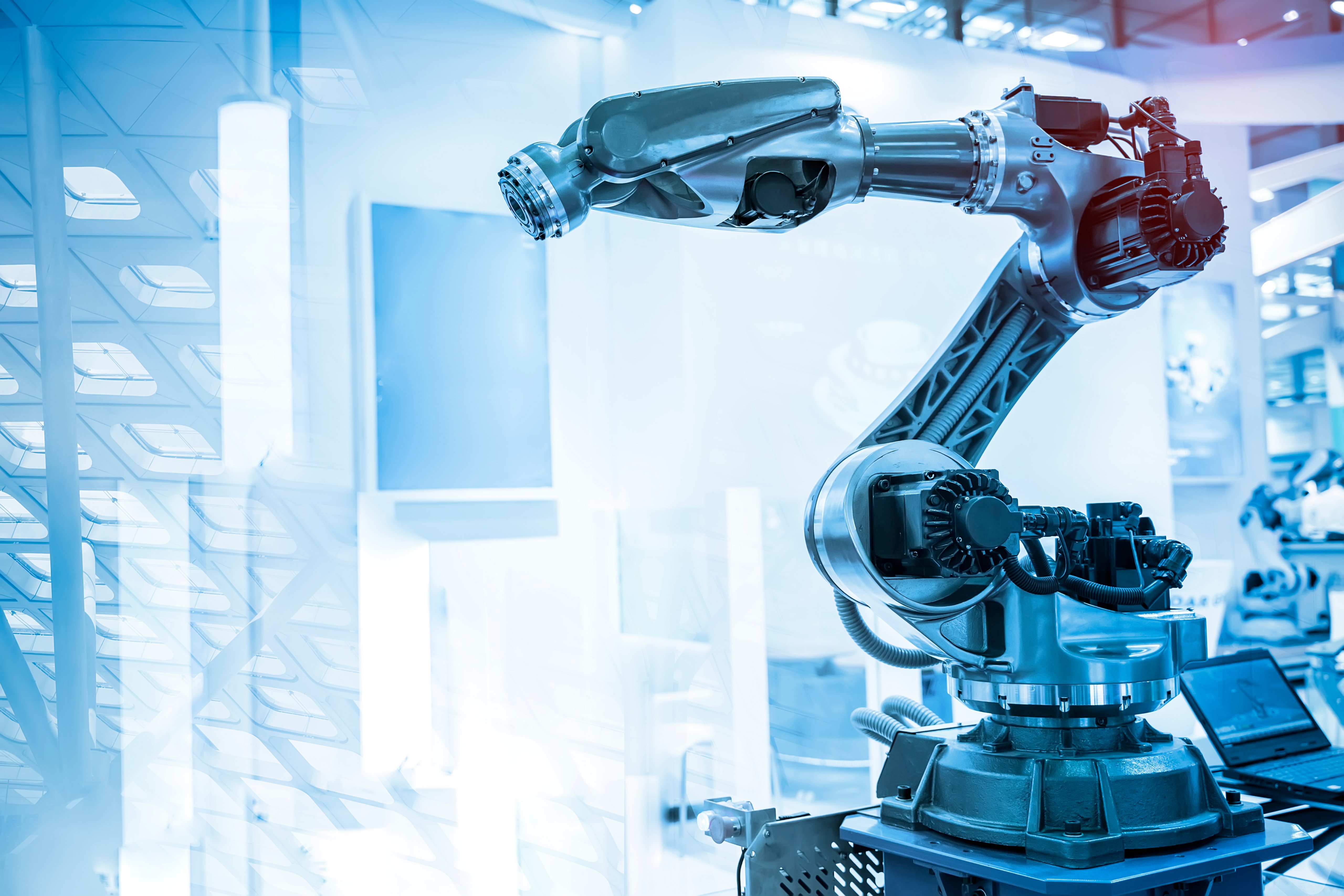 robotic arm catch for electronic assembly line. The robot for smart technology manufacturing process.
