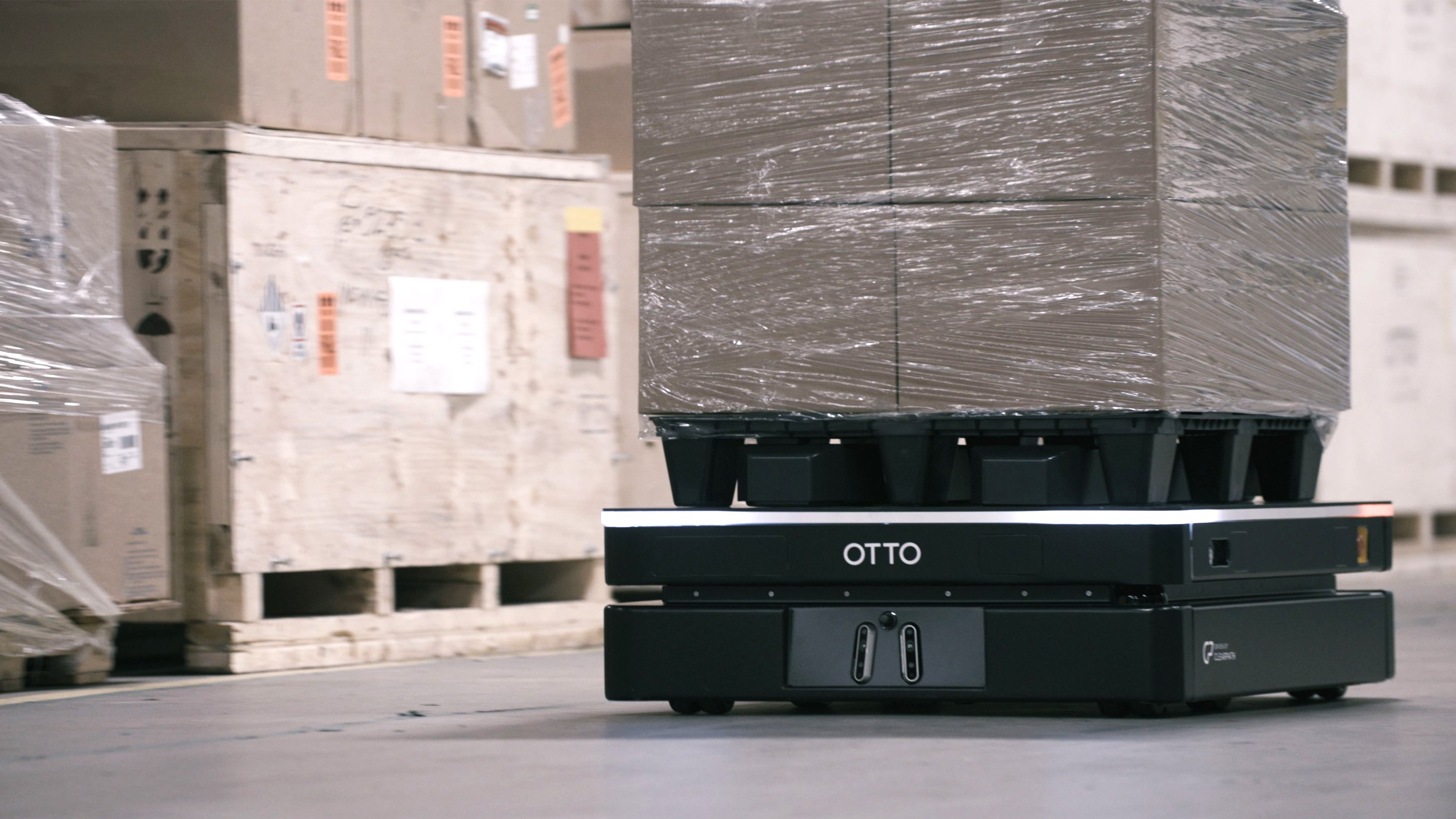 Packages on the autonomous mobile robot by OTTO motors