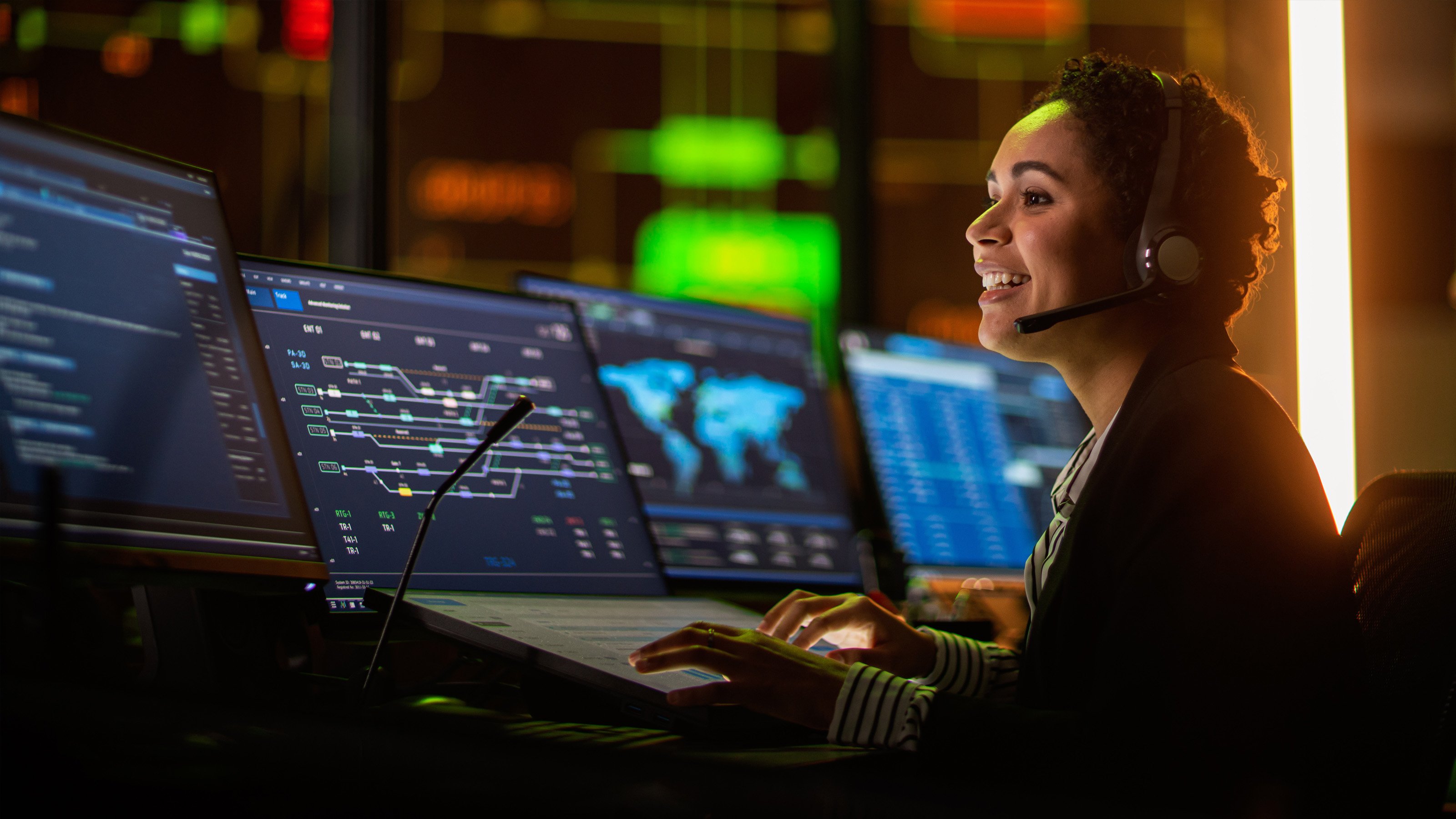 woman working with smart motor control center monitors