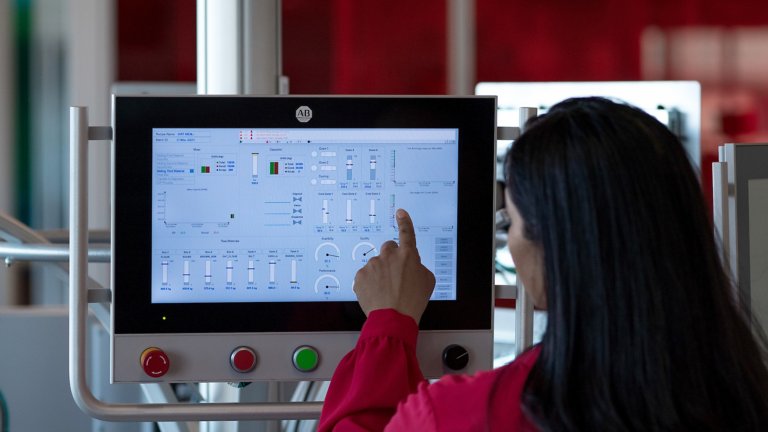 Woman using hmi touchscreen