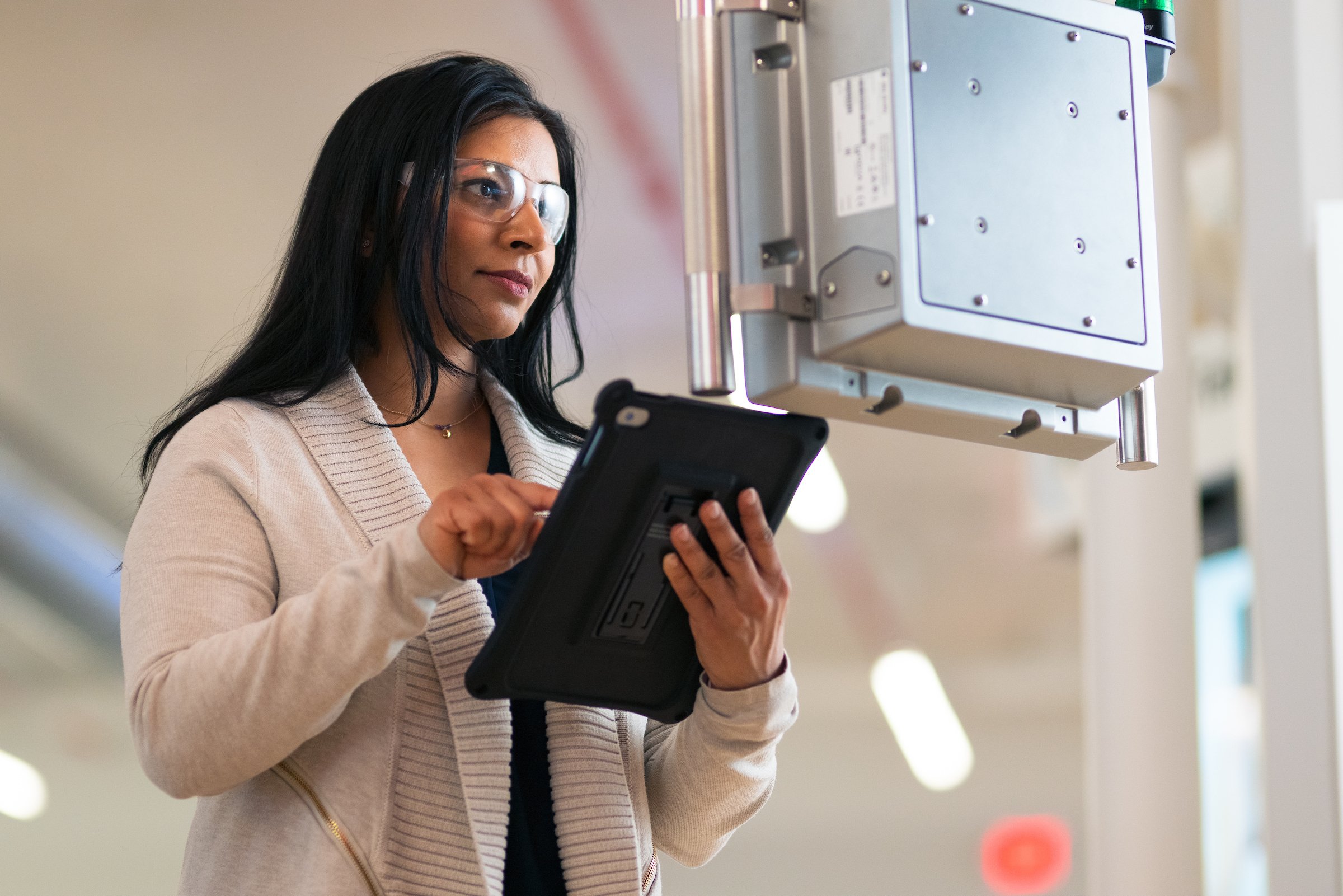 Woman with tablet HMI