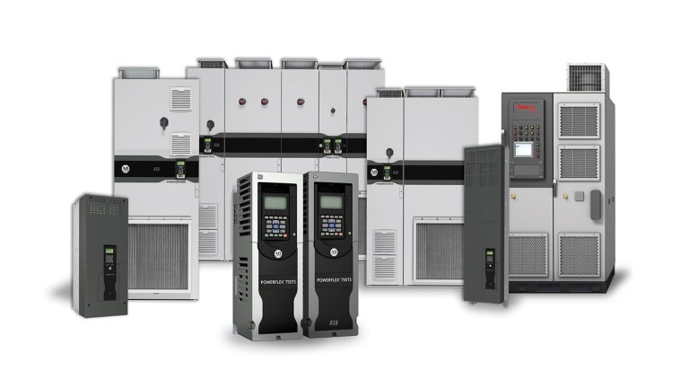 Eight tall standing gray and black metal industrial cabinets and PowerFlex variable frequency drive units facing forward.