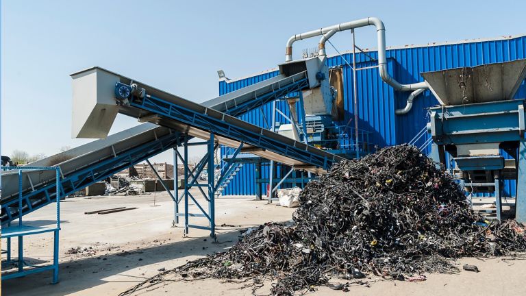 Plastic recycling facility/Plastic and rubber components resulted from cars disassembled are being shredded and separated during recycling process