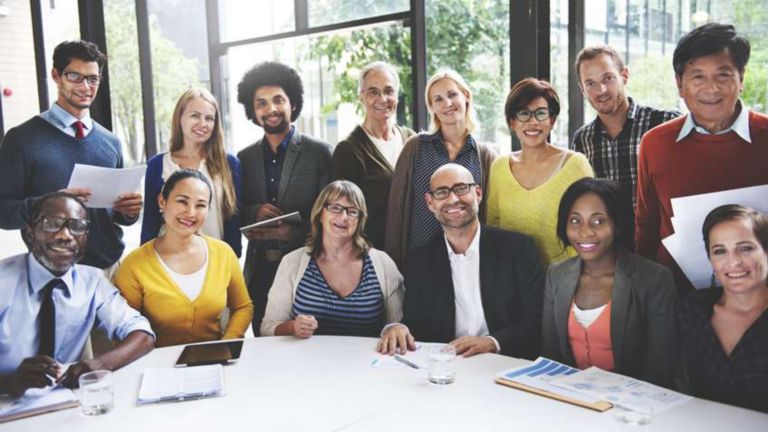 Group of diverse employees smiling at the camera