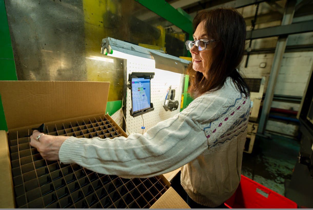 Woman working in Operational Control Manufacturing Floor