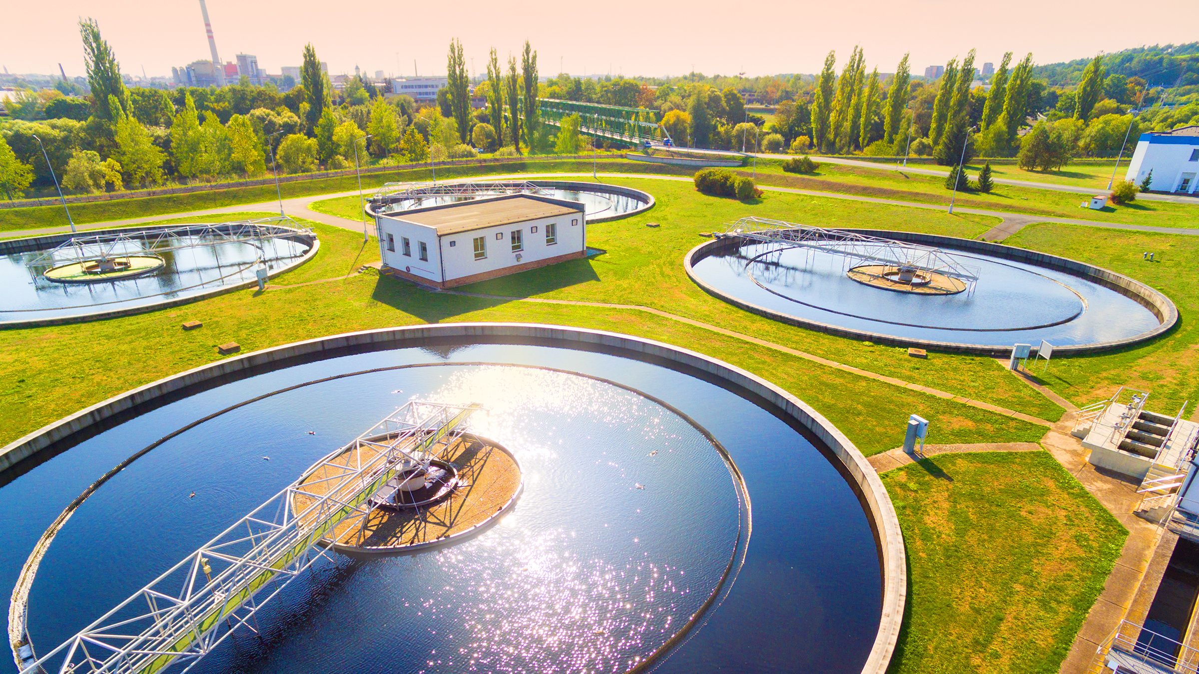 Aerial view of to a sewage treatment plant on a sunny day